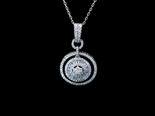 Load image into Gallery viewer, 0.700cts Round Brilliant and Baguette Cut Diamonds | Designer Circle of Life Dangling Necklace | 18kt White Gold
