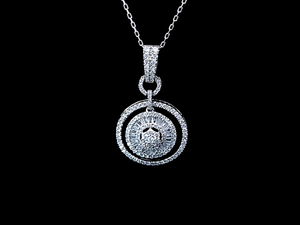 0.700cts Round Brilliant and Baguette Cut Diamonds | Designer Circle of Life Dangling Necklace | 18kt White Gold